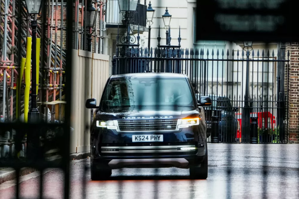 Britain's Prince Harry, inside a vehicle, arrives at Clarence House, an official residence of Britain's King Charles, in London, Britain, September 10, 2025. REUTERS/Carlos Jasso