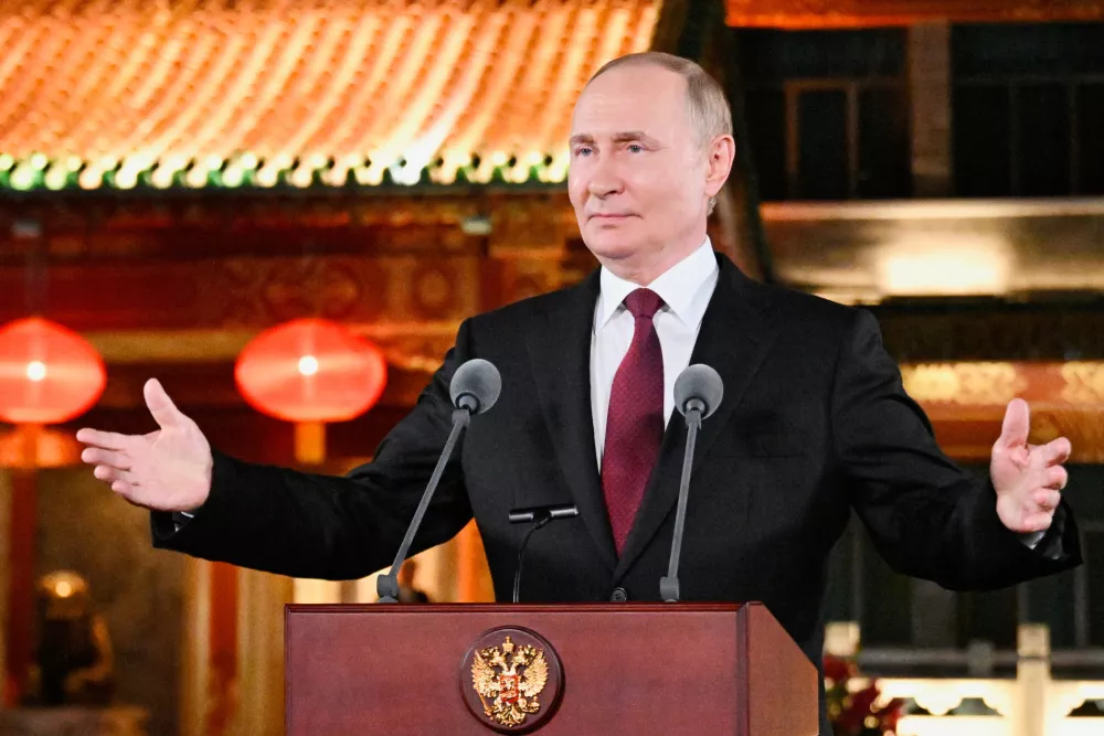 Russian President Vladimir Putin gestures during a press conference, at the end of his visit to China for the Tianjin SCO Summit and the military parade to mark the 80th anniversary of the end of World War Two, in Beijing, China, Wednesday, Sept. 3, 2025. (Sergei Bobylev, Sputnik, Kremlin Pool Photo via AP)