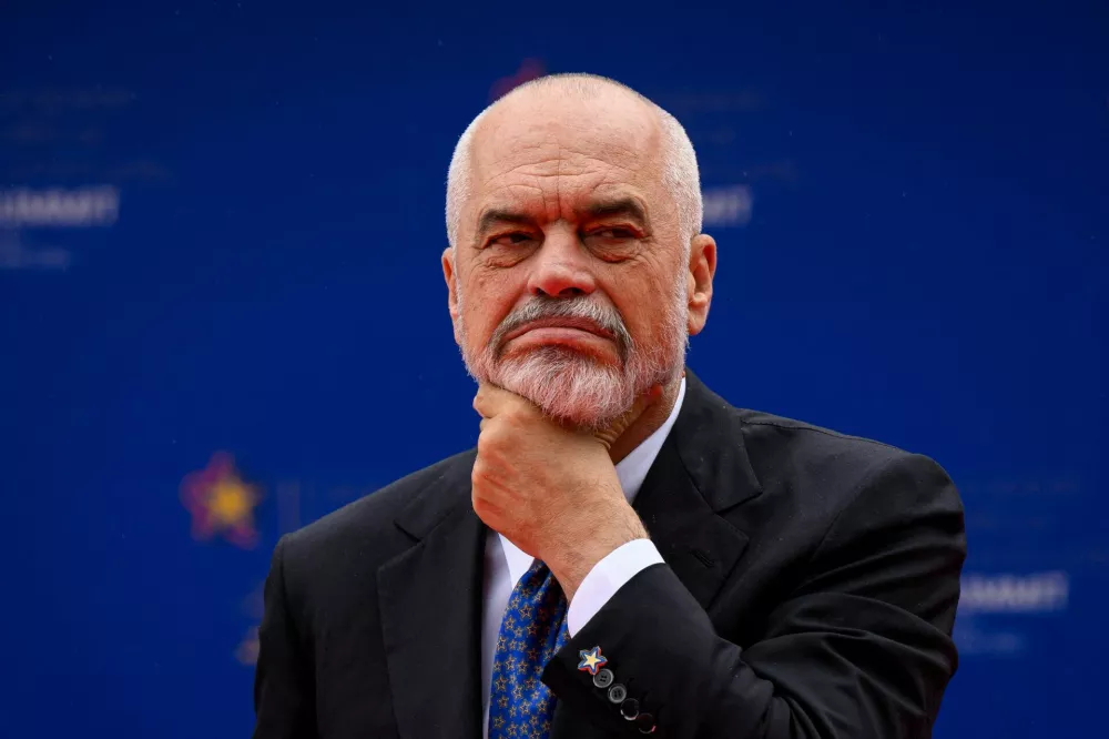 FILE PHOTO: Albanian Prime Minister Edi Rama awaits the first arrivals at the beginning of the EPC Summit in Tirana, Albania May 16, 2025.   Leon Neal/Pool via REUTERS/File Photo
