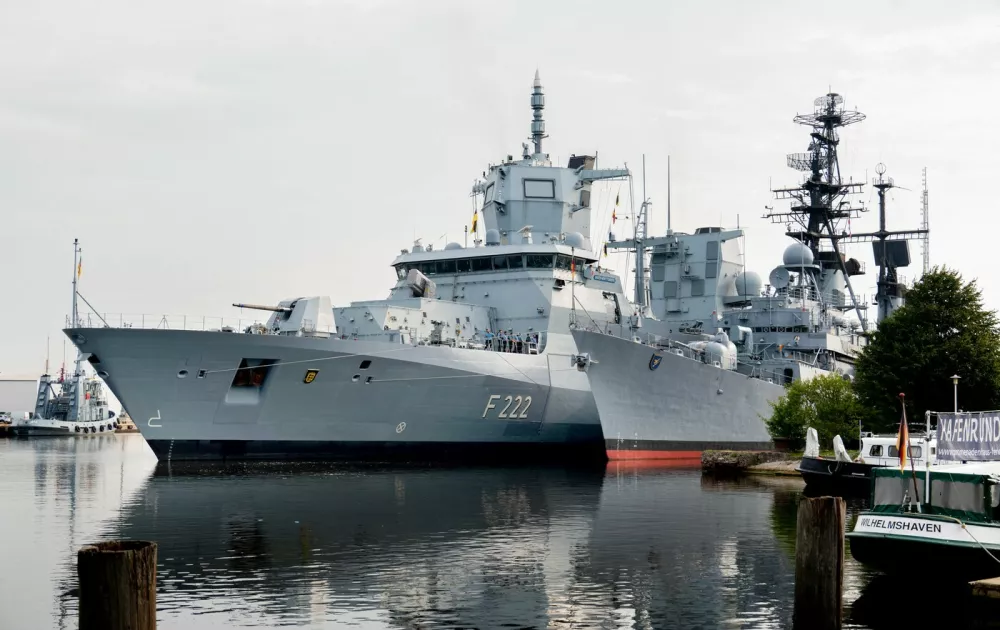 14 August 2025, Lower Saxony, Wilhelmshaven: The frigate "Baden-Württemberg" (l, F 222) lies alongside the former destroyer "Mölders" (D 186), today a museum ship in the Wilhelmshaven Naval Museum. From aboard the frigate "Baden-Württemberg", Commander Frigate Captain Bogislav von Puttkamer was able to welcome his father, former Flotilla Admiral Hubertus von Puttkamer, former commander of the "Mölders". Photo: Hauke-Christian Dittrich/dpa,Image: 1029375137, License: Rights-managed, Restrictions: GERMANY OUT, Model Release: no