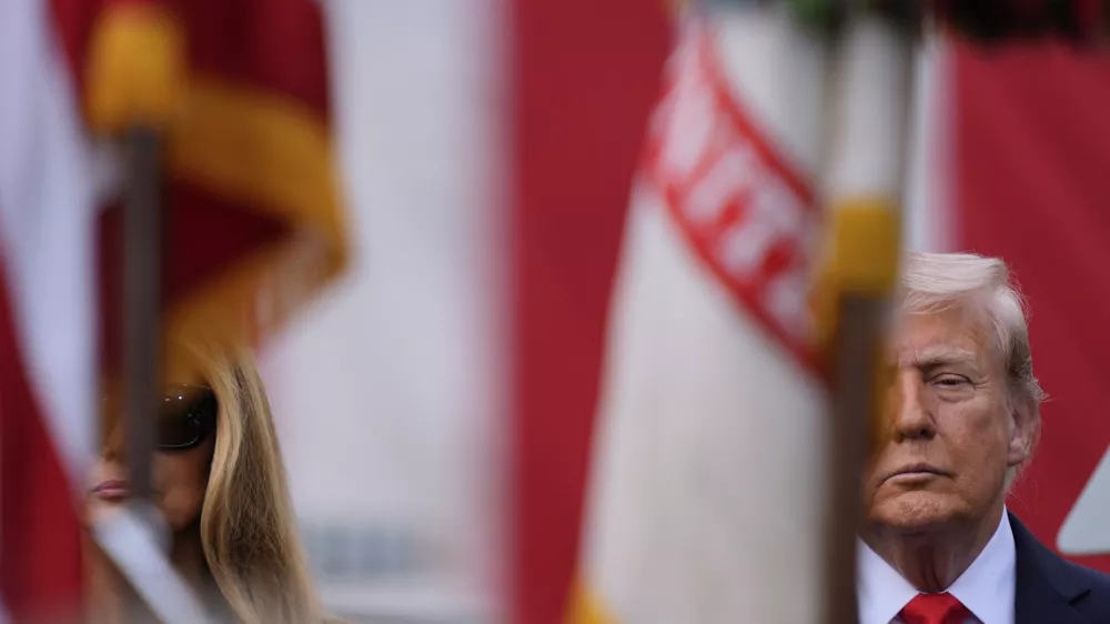President Donald Trump and first lady Melania Trump attend a ceremony at the Pentagon to commemorate the 24th anniversary of the 9/11 attacks, Thursday, Sept. 11, 2025, in Washington. (AP Photo/Julia Demaree Nikhinson)