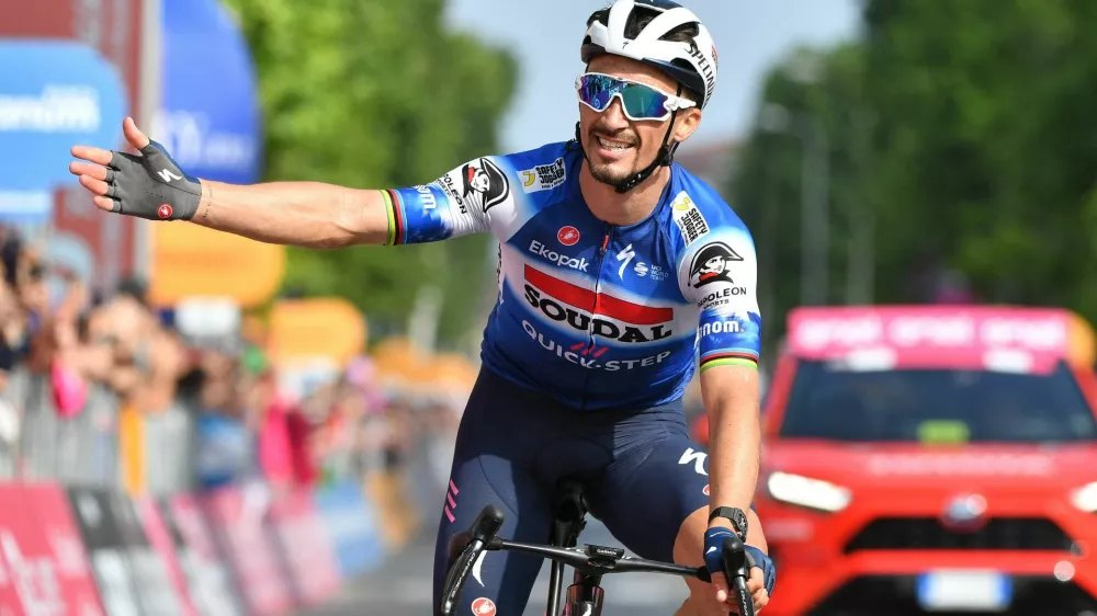 Cycling - Giro d'Italia - Stage 12 - Martinsicuro to Fano - Italy - May 16, 2024 Soudal Quick-Step's Julian Alaphilippe celebrates after winning stage 12 REUTERS/Jennifer Lorenzini