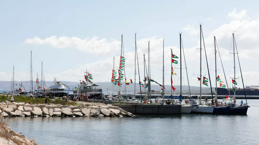 Participants of the Global Sumud Flotilla wait to set sail towards Gaza, with other boats from Tunisia, as part of an international humanitarian aid initiative to break Israel's naval blockade and deliver vital supplies to Palestinians, at the port of Bizerte, Tunisia September 13, 2025. REUTERS/Zoubeir Souissi