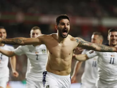 ﻿Soccer Football - World Cup - UEFA Qualifiers - Group A - Portugal v Serbia - Estadio da Luz, Lisbon, Portugal - November 14, 2021 Serbia's Aleksandar Mitrovic celebrates scoring their second goal REUTERS/Pedro Nunes