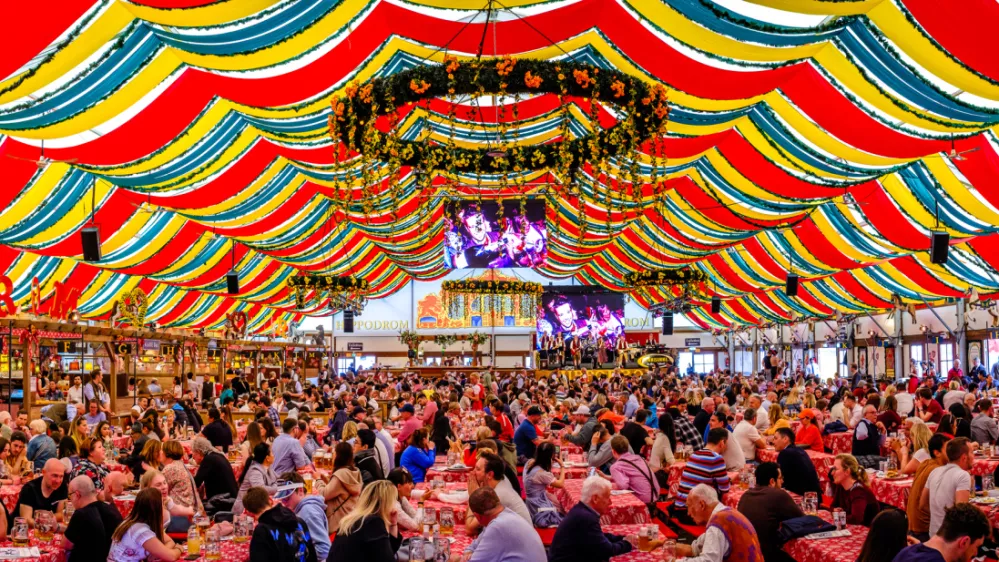 Munich, Germany - April 23: typical bavarian beertent with guests and decoration at the annual spring festival (Frühlingsfest) in Munich on April 23, 2023