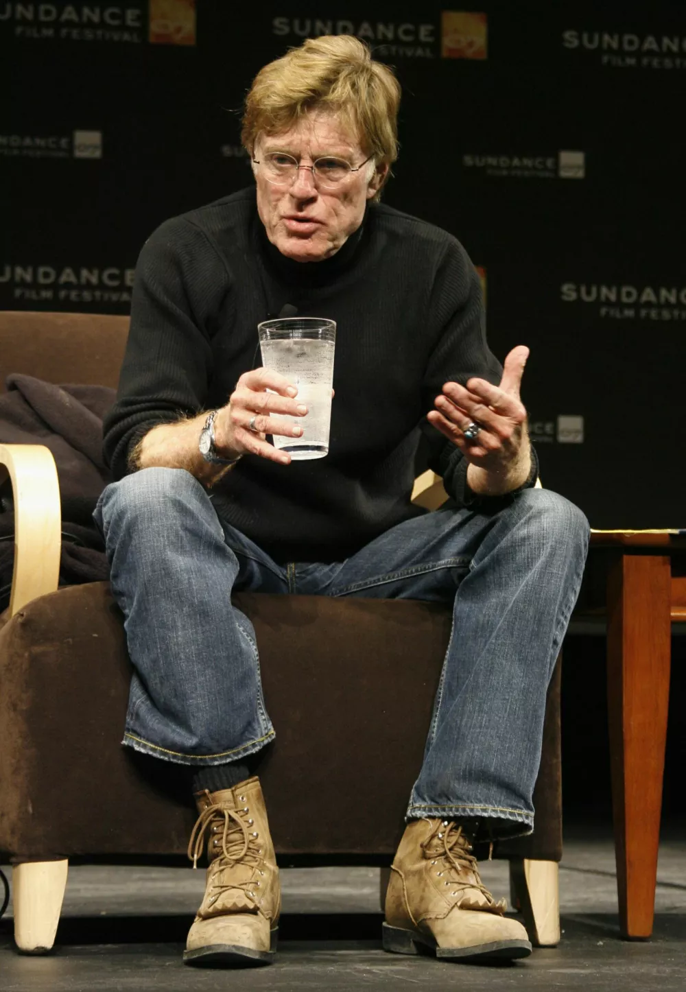 Robert Redford, president and founder of the Sundance Institute, answers a question at the opening day news conference for the 2007 Sundance Film Festival in Park City, Utah, January 18, 2007. The festival, the top U.S. event for movies made outside Hollywood, will feature 123 films over ten days starting January 18. REUTERS/Fred Prouser (UNITED STATES)
