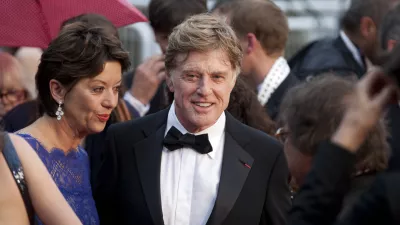﻿Actor Robert Redford, centre, and his wife Sibylle Szaggars, centre left, arrive for the screening of All Is Lost at the 66th international film festival, in Cannes, southern France, Wednesday, May 22, 2013. (AP Photo/Virginia Mayo)