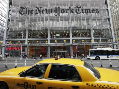 ﻿FILE - In this Tuesday, Oct. 18, 2011, file photo, traffic passes the New York Times building, in New York. The New York Times Co. reports financial earnings on Wednesday, May 3, 2017. (AP Photo/Mark Lennihan, File)