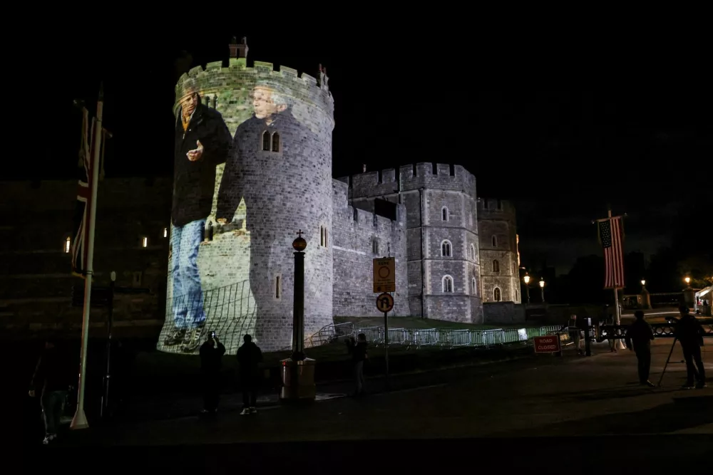 An image of Britain's Prince Andrew alongside disgraced financier Jeffrey Epstein is projected on Windsor castle, after U.S. President Donald Trump and first lady Melania Trump arrival for a state visit to the country, in Windsor, Berkshire, Britain September 16, 2025. REUTERS/Phil Noble