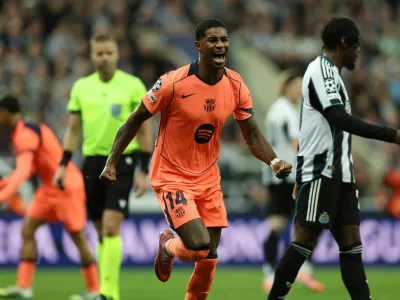 Soccer Football - UEFA Champions League - Newcastle United v FC Barcelona - St James' Park, Newcastle, Britain - September 18, 2025 FC Barcelona's Marcus Rashford celebrates scoring their first goal REUTERS/Scott Heppell