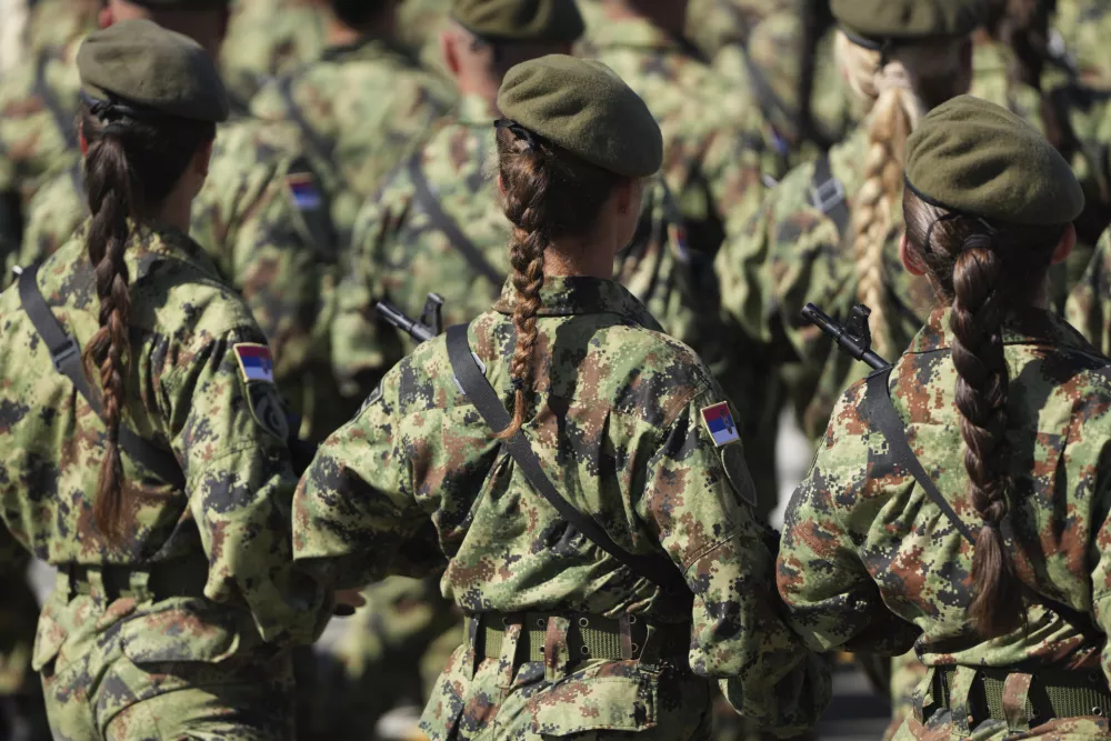 Serbian Army soldiers perform during a military parade in Belgrade, Serbia, Saturday, Sept. 20, 2025. (AP Photo/Darko Vojinovic)