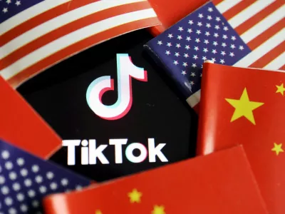 FILE PHOTO: China and U.S. flags are seen near a TikTok logo in this illustration picture taken July 16, 2020. REUTERS/Florence Lo/Illustration/File Photo