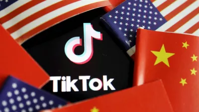 FILE PHOTO: China and U.S. flags are seen near a TikTok logo in this illustration picture taken July 16, 2020. REUTERS/Florence Lo/Illustration/File Photo