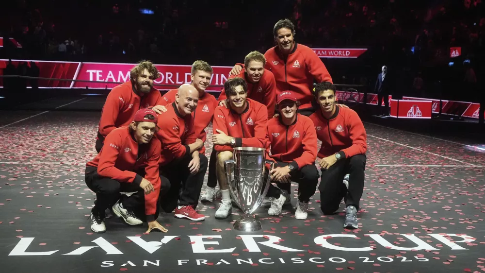 Team World players celebrate after defeating Team Europe on the third day to win the Laver Cup tennis tournament in San Francisco, Sunday, Sept. 21, 2025. (AP Photo/Jeff Chiu)