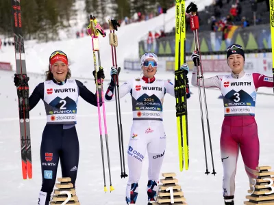 First place, Norway's Gyda Hansen Westvold, center, poses with second place, Germany's Nathalie Armbruster, left, and third place, Japan's Haruka Kasai during the Women's Nordic Combined Gundersen Normal Hill HS100/5km at the Nordic World Ski Championships in Planica, Slovenia, Friday, Feb. 24, 2023. (AP Photo/Darko Bandic)