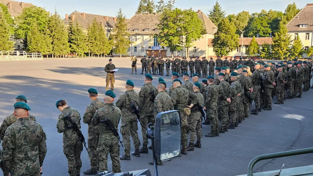 Polish army troops stand guard, as part of the 12th and 17th Mechanized Brigades are starting to move to the east of the country, in Poland, July 8, 2023. Courtesy of 12 Brygada Zmechanizowana/Handout via REUTERS  THIS IMAGE HAS BEEN SUPPLIED BY A THIRD PARTY. MANDATORY CREDIT. NO RESALES. NO ARCHIVES