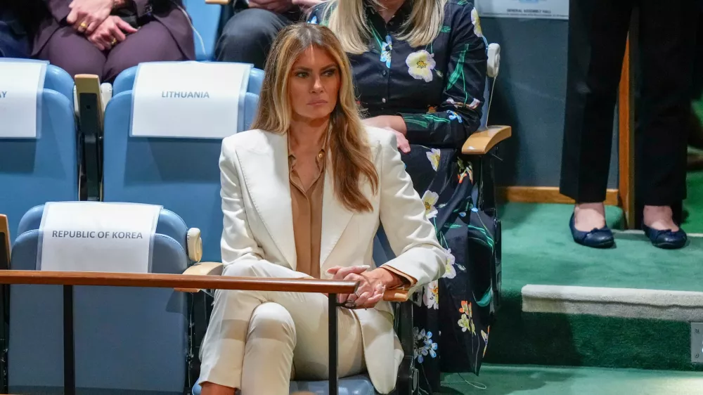 First Lady Melania Trump listens as President Donald Trump speaks during the 80th session of the United Nations General Assembly, Tuesday, Sept. 23, 2025, at U.N. headquarters. (AP Photo/Yuki Iwamura)