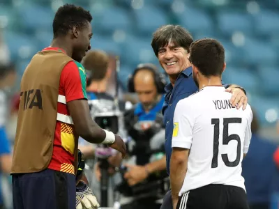 ﻿Soccer Football - Germany v Cameroon - FIFA Confederations Cup Russia 2017 - Group B - Fisht Stadium, Sochi, Russia - June 25, 2017  Germany coach Joachim Low and Amin Younes celebrate after the match  REUTERS/Carl Recine