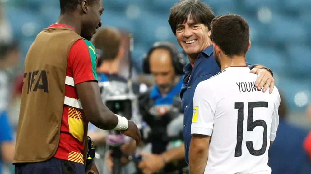 ﻿Soccer Football - Germany v Cameroon - FIFA Confederations Cup Russia 2017 - Group B - Fisht Stadium, Sochi, Russia - June 25, 2017  Germany coach Joachim Low and Amin Younes celebrate after the match  REUTERS/Carl Recine