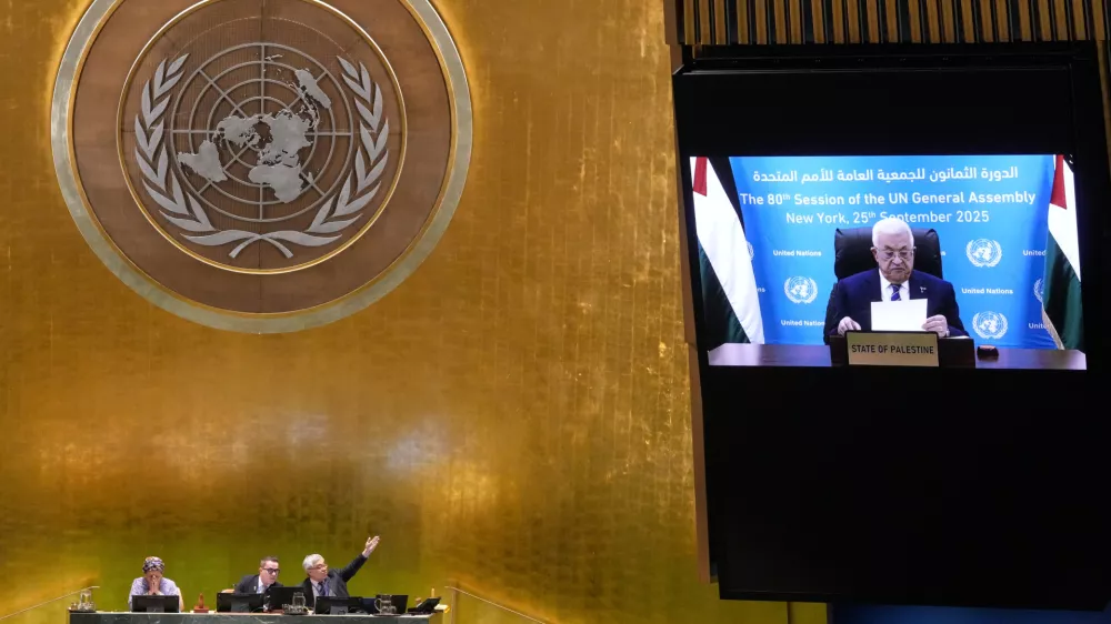 Palestine President Mahmoud Abbas addresses the 80th session of the United Nations General Assembly via video, Thursday, Sept. 25, 2025. (AP Photo/Richard Drew)