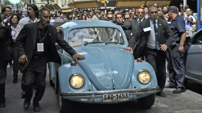 Former Uruguayan president Jose Pepe Mujica inside his Volkswagen 1987 leave the Plaza Independencia, after the inauguration of the new President Tabare Vazquez on March 1, 2015 in Montevideo. Known for his push to legalize cannabis, spartan lifestyle and devotion to his three-legged dog, Uruguay's outspoken President Jose "Pepe" Mujica will step down Sunday more popular than ever.,Image: 221817834, License: Rights-managed, Restrictions:, Model Release: no