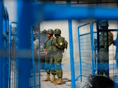 Military personnel guard the entrance to El Inca prison after a security operation due to riots, following the disappearance of Jose Adolfo Macias, alias 'Fito', leader of the Los Choneros criminal group, in Quito, Ecuador January 8, 2024. REUTERS/Karen Toro 