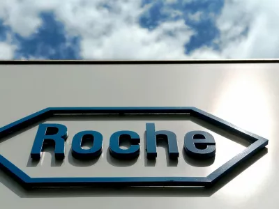 FILED - 20 July 2004, Bavaria, Penzberg: The logo of the Swiss pharmaceutical company Roche is seen at the entrance of the plant in Penzberg near Bad Toelz. Photo: Daniel Karmann/dpa