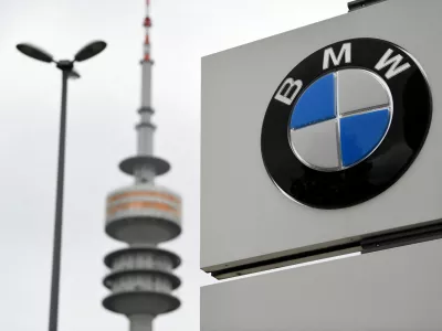 FILE PHOTO: The logo of German car manufacturer BMW is seen at the company headquarters in Munich, Germany, May 14, 2020. REUTERS/Andreas Gebert/File Photo