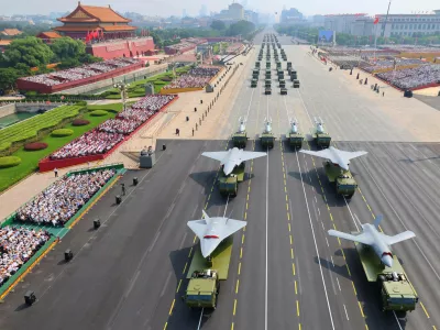 FILE - In this photo provided by China's Xinhua News Agency,In this photo released by Xinhua News Agency, drones and other armament formations pass during the military parade to commemorate the 80th anniversary of the end of World War II held in front of Tiananmen Gate in Beijing, Wednesday, Sept. 3, 2025. (Liu Xu/Xinhua via AP, File)