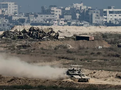 An Israeli tank manoeuvres in Gaza, as seen from the Israeli side of the border, September 28, 2025. REUTERS/Amir Cohen