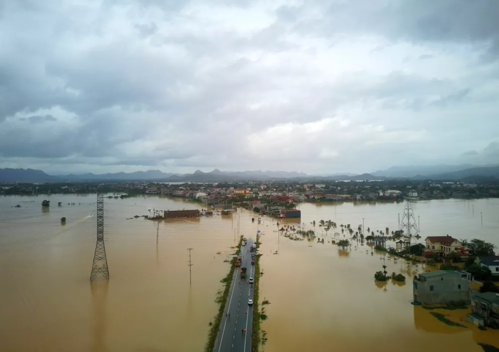 This aerial photo shows flooding caused by rain following typhoon Bualoi in Thanh Hoa, Vietnam, Tuesday, Sept. 30, 2025. (Tran Van Hoang/VNA via AP)