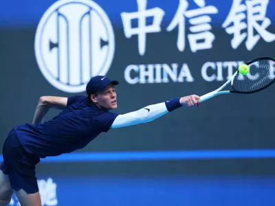 Tennis - China Open - The Beijing Olympic Green Tennis Center, Beijing, China - September 30, 2025 Italy's Jannik Sinner in action during his semi final match against Australia's Alex de Minaur REUTERS/Tingshu Wang