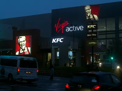 ﻿A KFC store is seen next door to a Virgin Active gym in Hillcrest, South Africa September 28, 2017. REUTERS/Rogan Ward