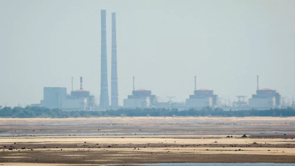 FILE PHOTO: A view shows Zaporizhzhia Nuclear Power Plant from the bank of Kakhovka Reservoir near the town of Nikopol after the Nova Kakhovka dam breached, amid Russia's attack on Ukraine, in Dnipropetrovsk region, Ukraine June 16, 2023. REUTERS/Alina Smutko/File Photo