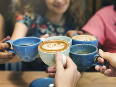 Young Women Drinking Coffee Concept