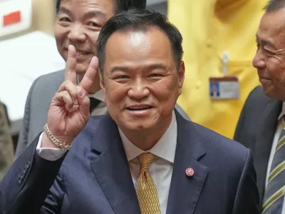 Thailand's Prime Minister Anutin Charnvirakul reacts before he presents the policy statement at the Parliament in Bangkok, Thailand, Monday, Sept. 29, 2025. (AP Photo/Sakchai Lalit)