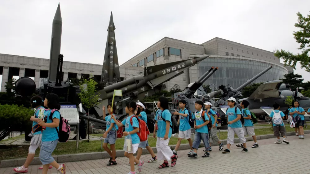 South Korean children walk by North Korean mock Scud-B missile, left, and other South Korean mock missiles at the Korea War Memorial Museum in Seoul, South Korea, Friday, June 19, 2009. The United States says it has deployed anti-missile defenses around Hawaii, following reports that North Korea is preparing to fire its most advanced ballistic missile in that direction to coincide with the U.S. Independence Day holiday next month. (AP Photo/ Lee Jin-man)
