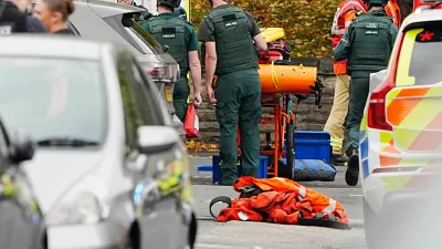 Emergency services at the scene of a stabbing incident at Heaton Park Hebrew Congregation synagogue, in Crumpsall, Manchester, England, Thursday Oct. 2, 2025. (Peter Byrne/PA via AP)