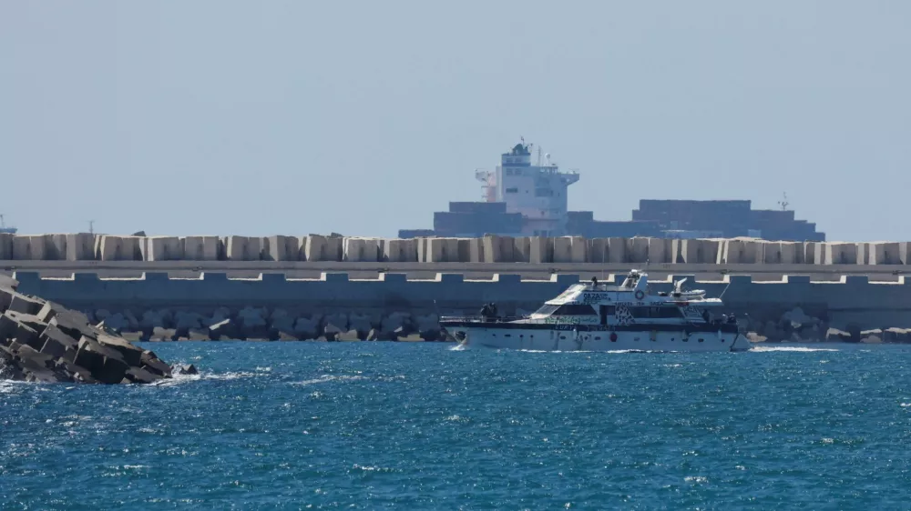An intercepted vessel from the Global Sumud Flotilla moves towards Ashdod Port, after Israel intercepted some of the vessels of the Flotilla aiming to reach Gaza and break Israel's naval blockade, in southern Israel, October 2, 2025. REUTERS/Ammar Awad