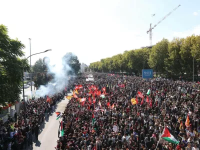 Demonstrators gather for a pro-Palestinians protest in Bologna, Italy, Friday, Oct. 3, 2025. (Guido Calamosca/LaPresse via AP)