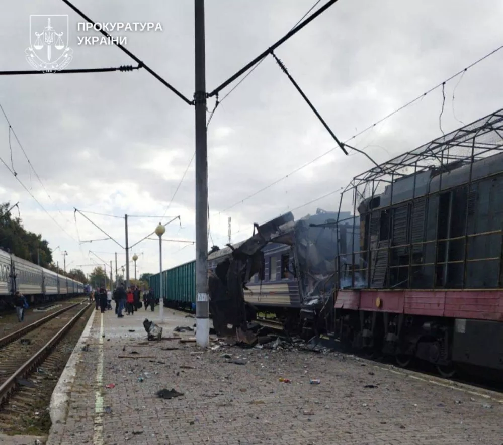 A train hit by a Russian drone strike sits damaged, amid Russia's attack on Ukraine, at the railway station in Shostka, Sumy region, Ukraine, October 4, 2025. Prosecutor General's Office via Telegram/Handout via REUTERS  THIS IMAGE HAS BEEN SUPPLIED BY A THIRD PARTY MANDATORY CREDIT. BEST QUALITY AVAILABLE