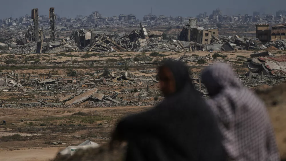 Destruction left by the Israeli air and ground offensive in Nuseirat, central Gaza Strip, Saturday, Oct. 4, 2025. (AP Photo/Abdel Kareem Hana)