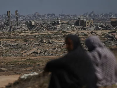 Destruction left by the Israeli air and ground offensive in Nuseirat, central Gaza Strip, Saturday, Oct. 4, 2025. (AP Photo/Abdel Kareem Hana)
