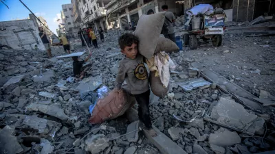 GAZA CITY, GAZA - SEPTEMBER 30: Palestinian children collect usable belongings from the rubble after the Israeli strike on Abu Hasira Street in Gaza City, Gaza, on September 30, 2025. Several buildings were completely destroyed, and many others were severely damaged in the strike. Saeed M. M. T. Jaras / AnadoluNo Use USA No use UK No use Canada No use France No use Japan No use Italy No use Australia No use Spain No use Belgium No use Korea No use South Africa No use Hong Kong No use New Zealand No use Turkey