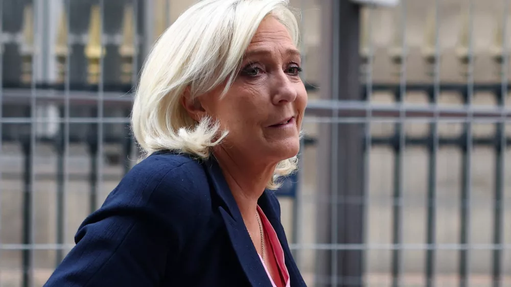 French far-right leader and member of parliament Marine Le Pen, President of the French far-right Rassemblement National (National Rally - RN) party parliamentary group, arrives for a meeting of the RN group at the National Assembly in Paris, as France faces a political crisis after the morning announcement of the resignation of the new French government, France, October 6, 2025. REUTERS/Gonzalo Fuentes
