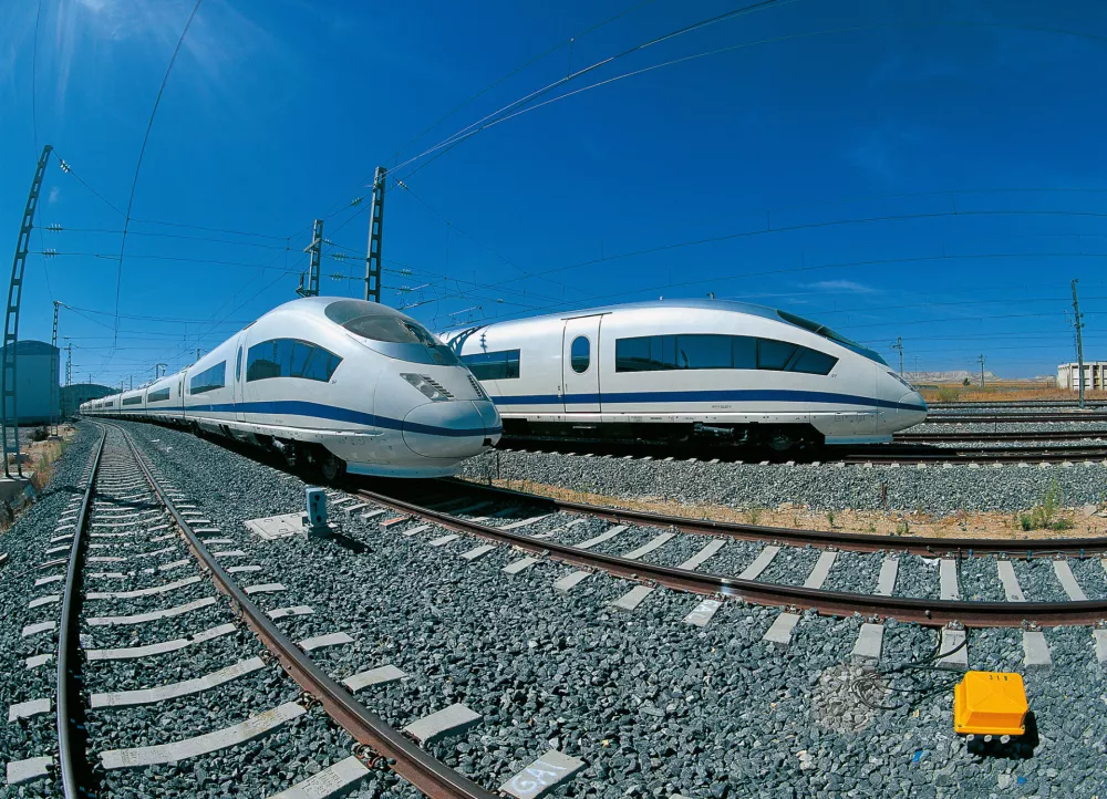 The Velaro is the fastest series-produced train in the world. In the future the Spanish National Railway Renfe will operate the Siemens Velaro high-speed trainset at a regular speed of 350 km/h. Last September, the Velaro reached the world record speed of 404 km/h.Der Velaro E ist der schnellste Serienzug der Welt. Die spanische Eisenbahn Renfe will den Hochgeschwindigkeitszug Velaro von Siemens demnächst mit einer regulären Betriebsgeschwindigkeit von 350 Kilometern pro Stunde fahren lassen. Im vergangenen September erreichte der Velaro bei einer Testfahrt sogar die Weltrekordgeschwindigkeit von 404 km/h.