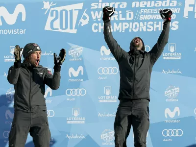 ﻿Snowboarding - FIS Snowboarding and Freestyle Skiing World Championships - Men's Snowboard Parallel Slalom - Sierra Nevada, Spain - 15/03/17 -  Gold medalist Andreas Prommegger of Austria (R) and silver medalist Benjamin Karl of Austria react on the podium. REUTERS/Albert Gea