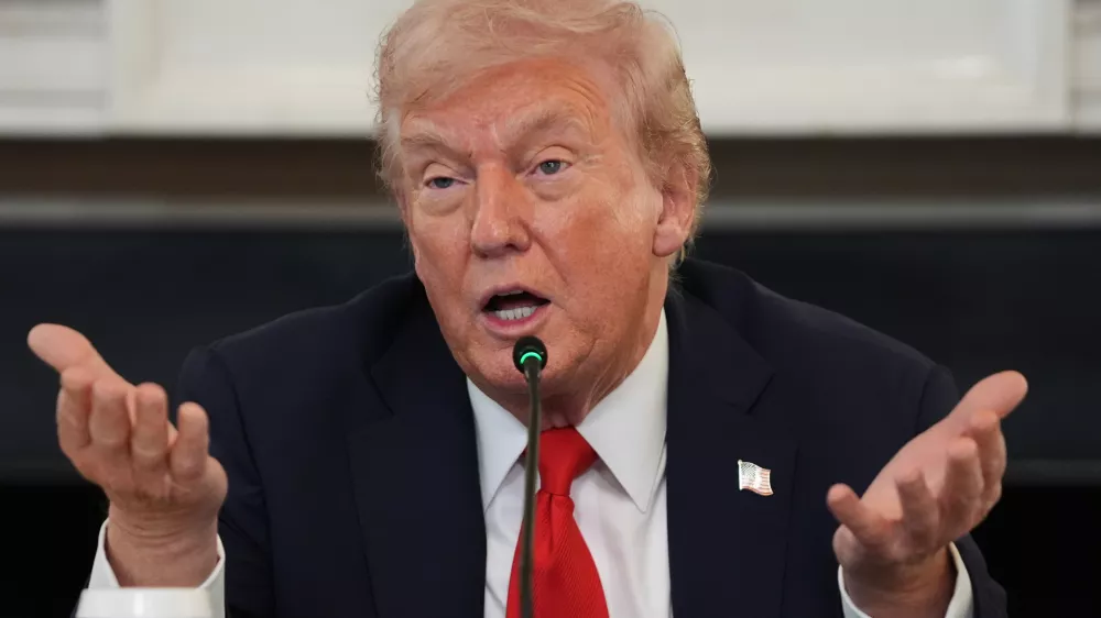 President Donald Trump speaks during a roundtable meeting on antifa in the State Dining Room at the White House, Wednesday, Oct. 8, 2025, in Washington. (AP Photo/Evan Vucci)