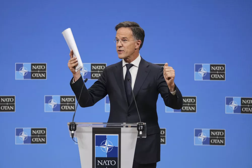 NATO Secretary General Mark Rutte speaks during a media conference at NATO headquarters in Brussels, Tuesday, Sept. 23, 2025. (AP Photo/Virginia Mayo)