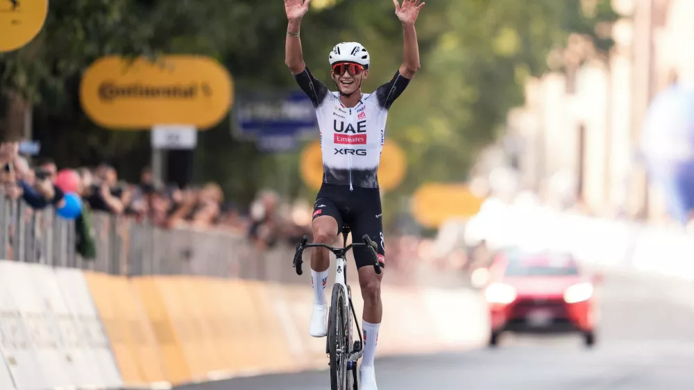 Rider Isaac Del Toro reacts as he wins the 109th edition of the Gran Piemonte cycling race, a 179km (111 miles) one day race from Dogliani to Acqui Terme, Italy, Thursday, Oct. 9, 2025, Italy. (Fabio Ferrari/LaPresse via AP)